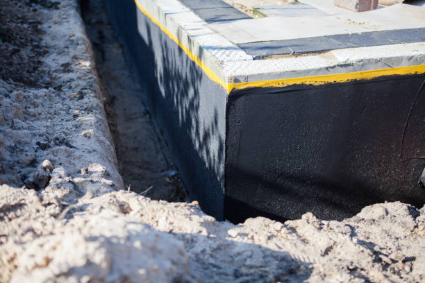 Professional Emergency Waterproofing technician working in Fayette, NY